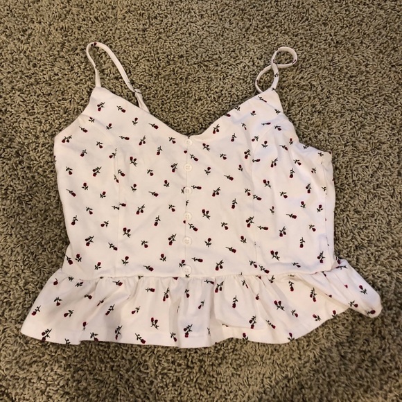 Forever 21 Tops - peplum floral tank top with cute buttons Forever 21 Tops - peplum floral tank top with cute buttons